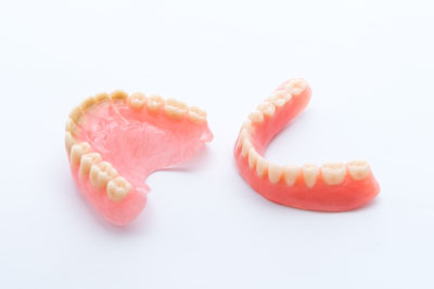 Can I use denture glue for teeth gems? I just need them to last a few  hours. Would they stick properly? - Quora